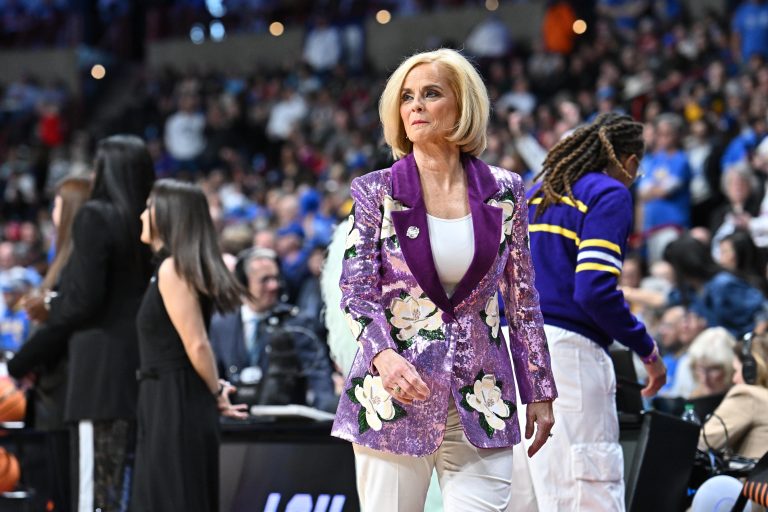 LSU Lady Tigers head coach Kim Mulkey walks the sideline during the first half of a Elite 8 NCAA Tournament basketball game against the UCLA Bruins at Spokane Arena.