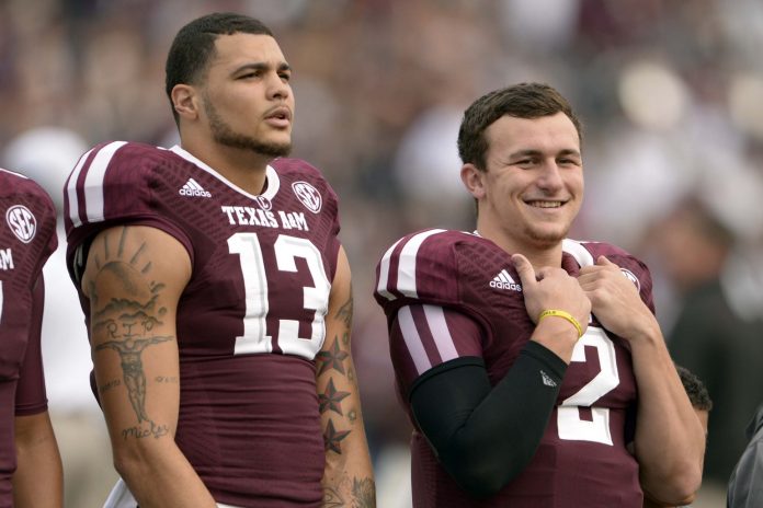 Texas A&M Aggies quarterback Johnny Manziel (2) and wide receiver Mike Evans (13) before the game against the Mississippi State Bulldogs at Kyle Field.