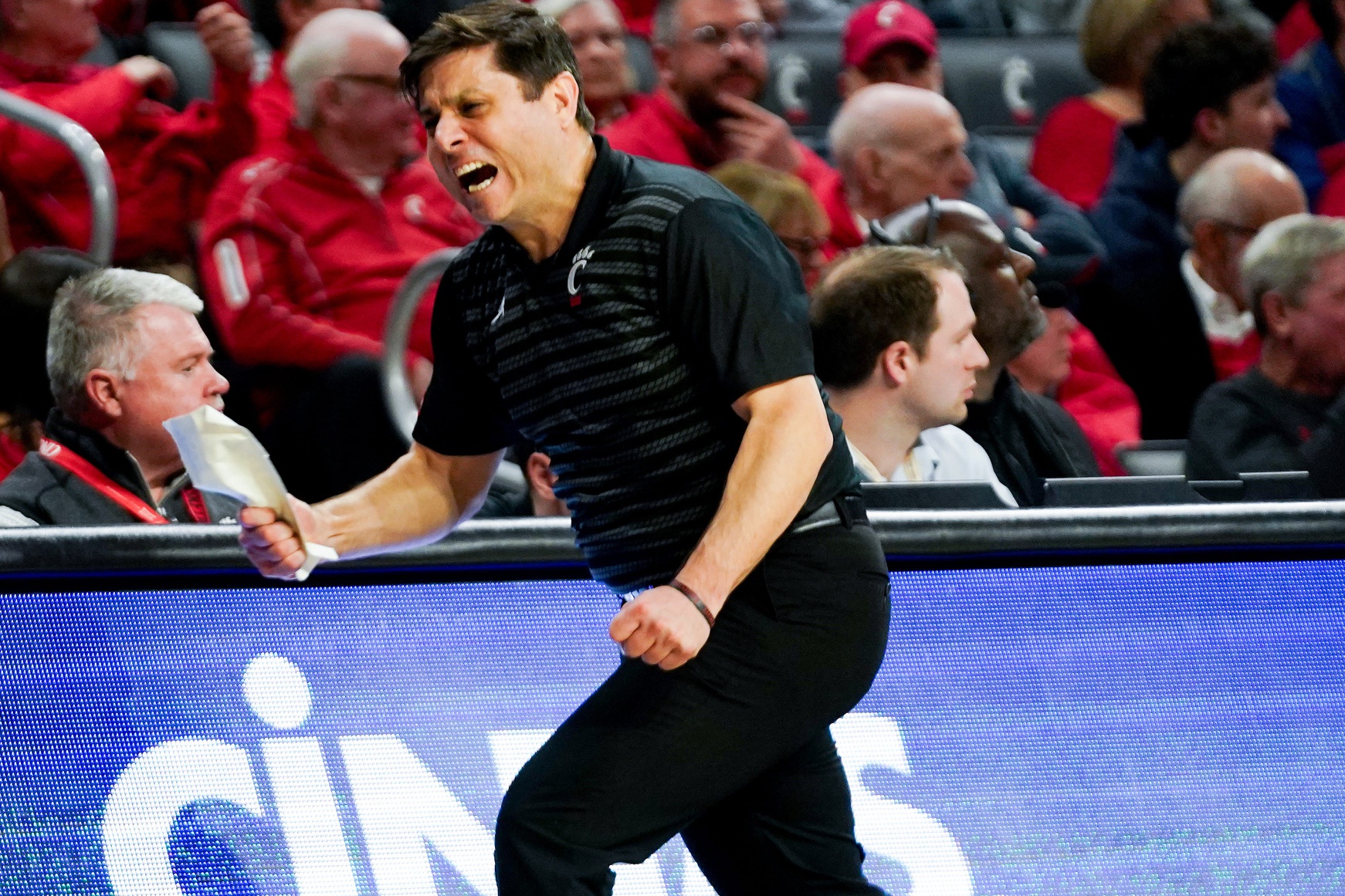 Wes Miller reacts to a play in the second half of a NCAA men’s basketball game between the Cincinnati Bearcats and Kansas State Wildcats, Wednesday, March 5, 2025, at Fifth Third Arena in Cincinnati. Wildcats won 54-49.