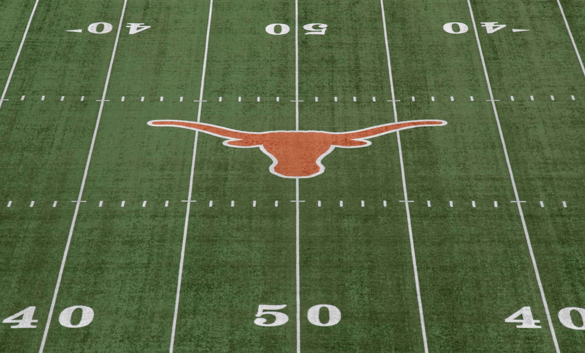 General overall view of the Texas Longhorns logo at midfield at Darrell K Royal-Texas Memorial Stadium.