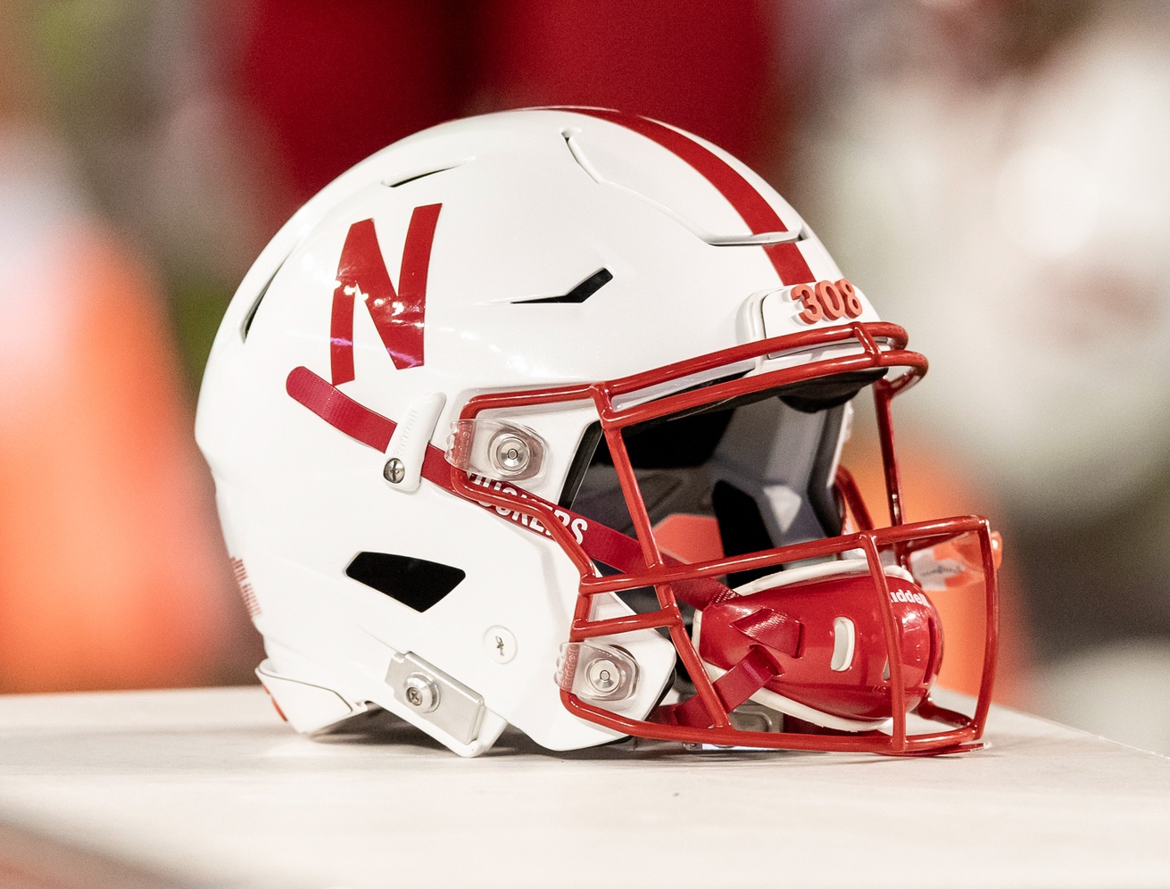 A Nebraska Cornhuskers helmet sits on the sidelines during the game against the Wisconsin Badgers at Camp Randall Stadium.