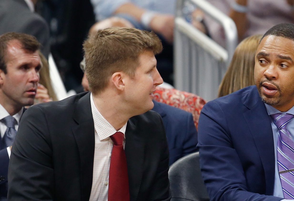 Cleveland Cavaliers assistant coaches Antonio Lang (right) and Dan Geriot talk on the bench during the second half against the Orlando Magic at Amway Center.