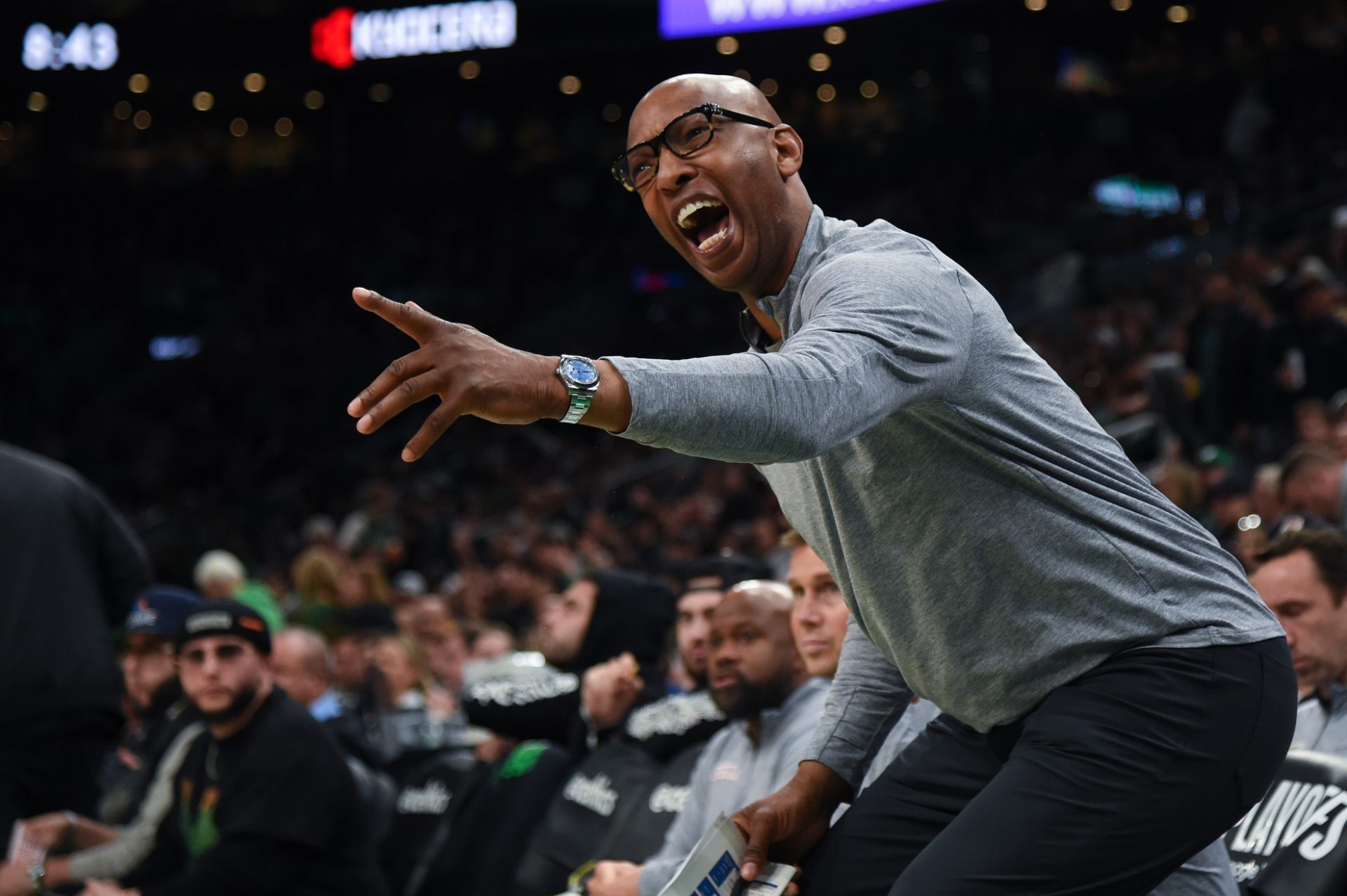 Philadelphia 76ers assistant coach Sam Cassell reacts to a play in the second half during game one of the 2023 NBA playoffs against the Boston Celtics at TD Garden.