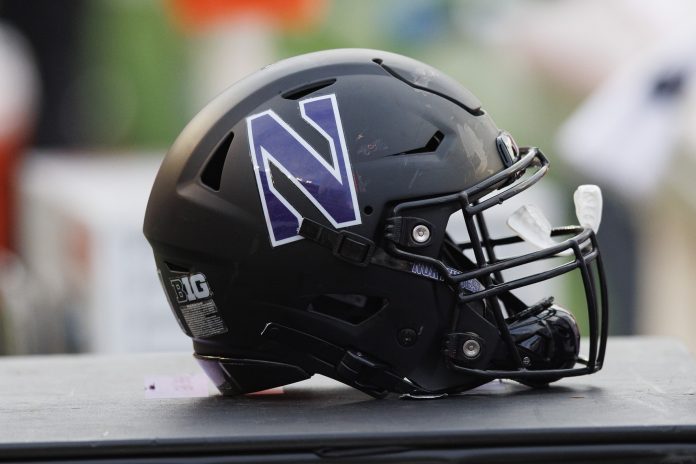 General view of a Northwestern Wildcats helmet on the sidelines during the game against the Wisconsin Badgers at Camp Randall Stadium.