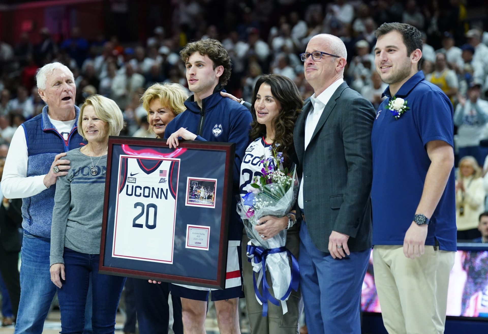 UConn Huskies head coach Dan Hurley poses with his son guard Andrew Hurley (20) along with his wife Andrea and other family members during senior day before the start of the game against the Seton Hall Pirates at Harry A. Gampel Pavilion.