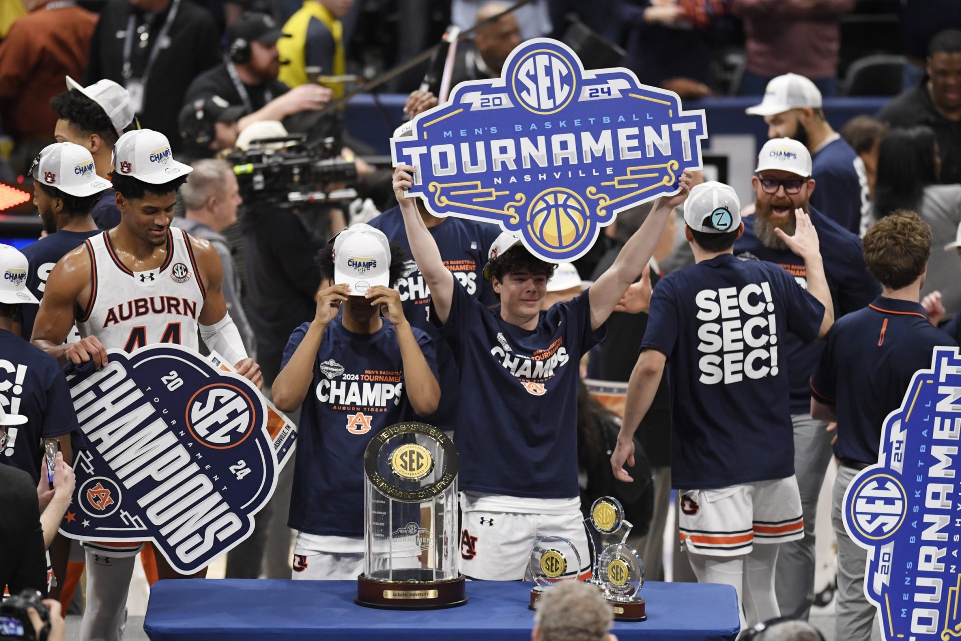 The Auburn Tigers celebrate after defeating the Florida Gators in the SEC Tournament championship game at Bridgestone Arena.