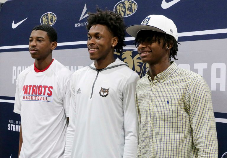 Three members of the Paul W. Bryant High basketball team signed their letters to play college basketball Tuesday. Marchello Perkins, Adrian Wooley, and Eric Grant all signed to play at colleges during the ceremony in the high school gymnasium.