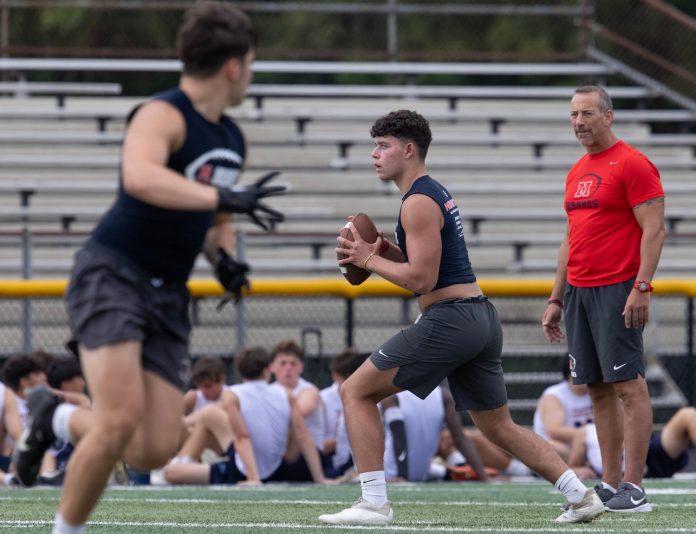 Ryan Dougherty throws a pass during 7v7 Football