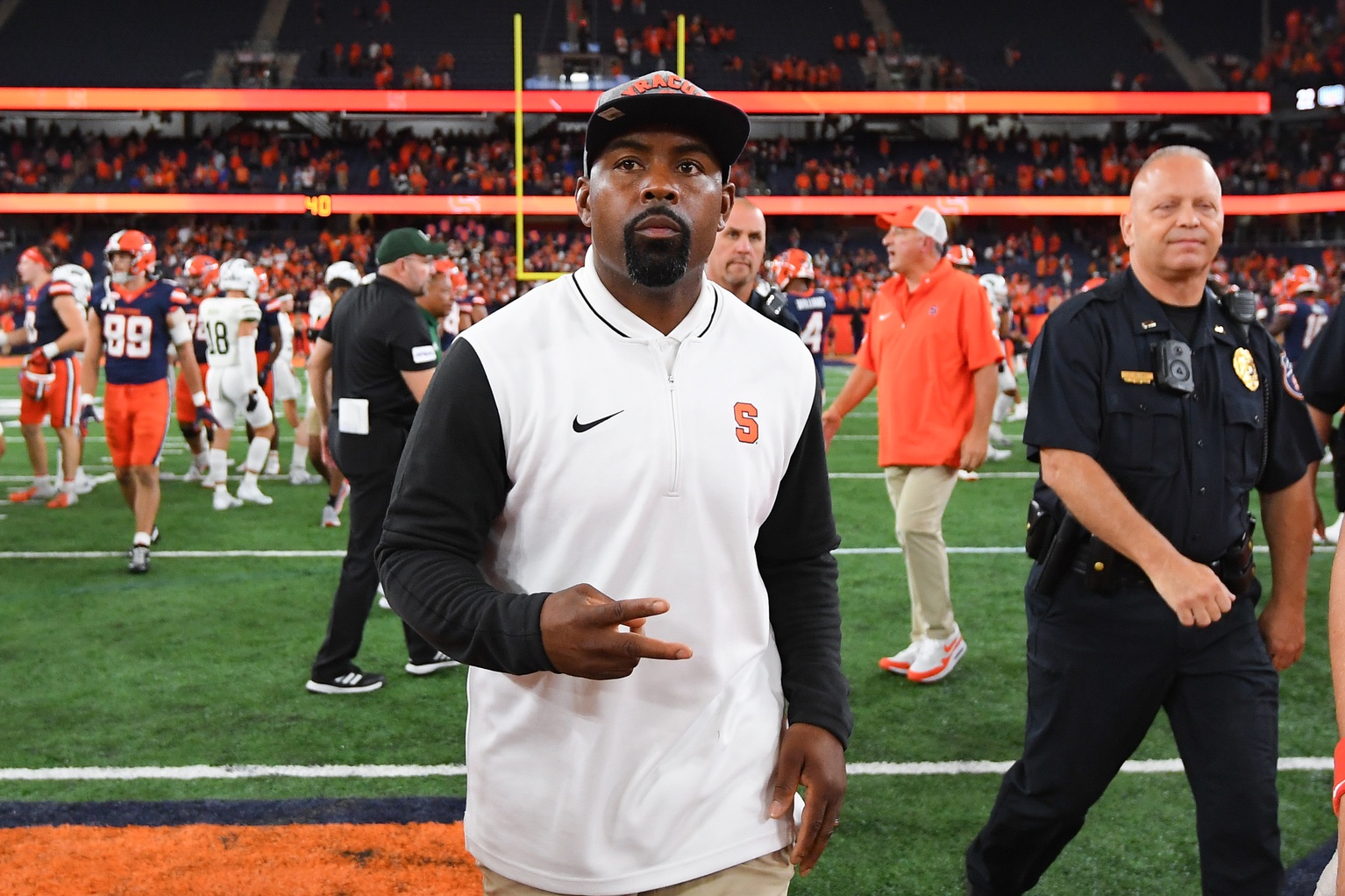 Syracuse Orange head coach Fran Brown walks on the field after a game against the Ohio Bobcats at the JMA Wireless Dome.