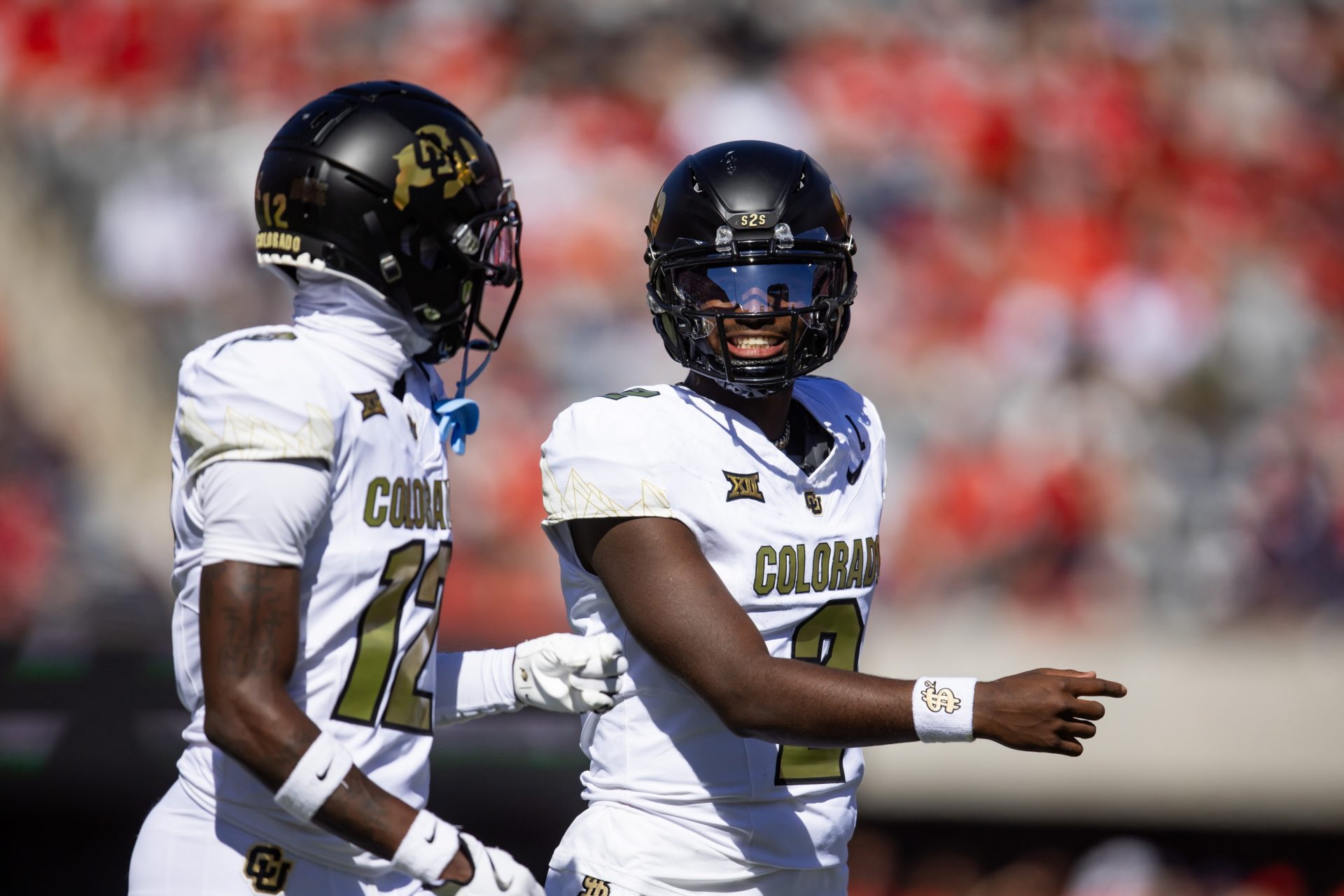 Colorado Buffalos quarterback Shedeur Sanders (2) with wide receiver Travis Hunter (12) against the Arizona Wildcats at Arizona Stadium.