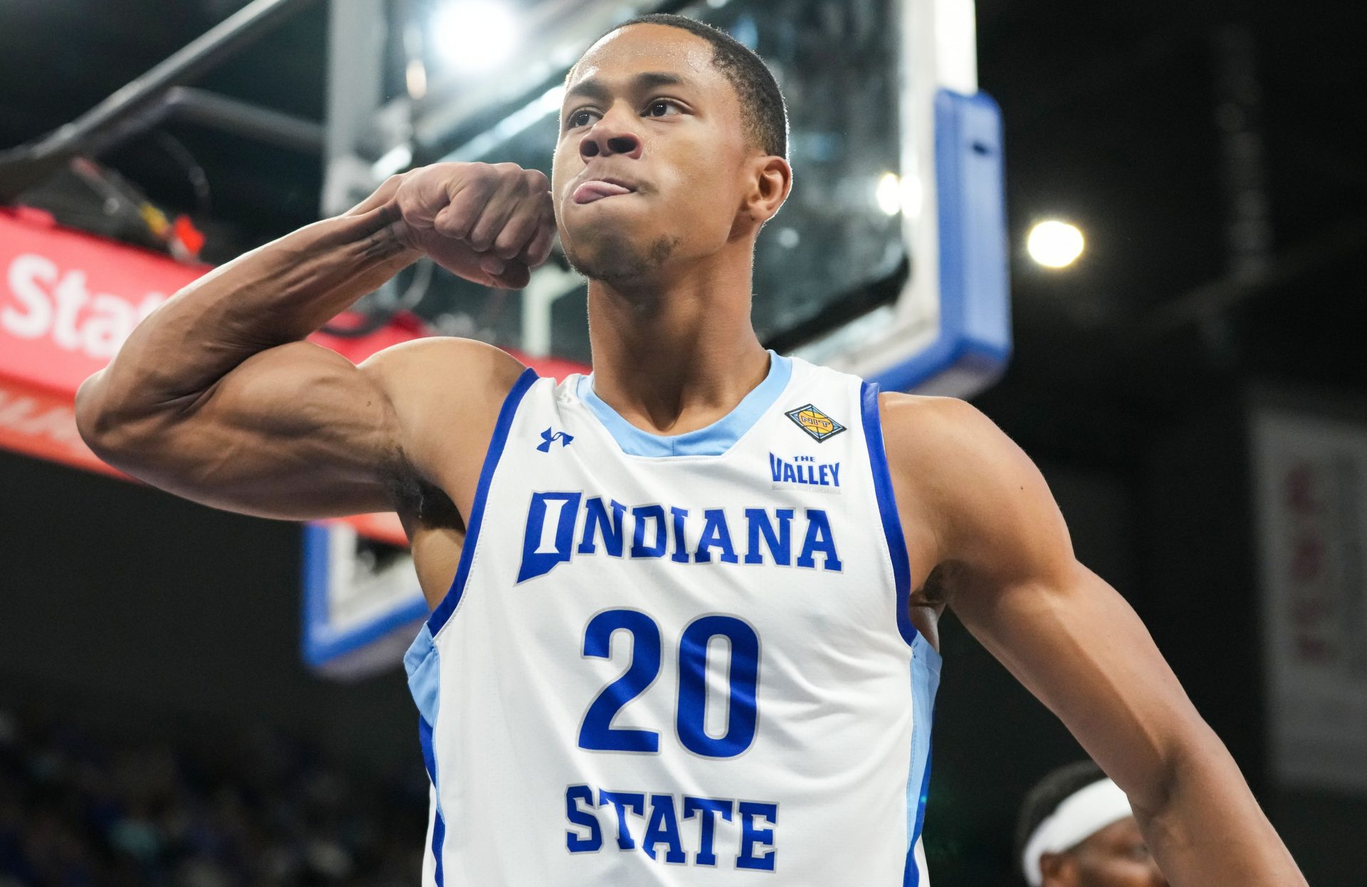 Jayson Kent (20) flexes to the student section after scoring tWednesday, March 20, 2024, during the first round of the NIT