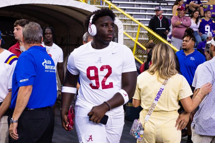 Alabama Crimson Tide defensive lineman Jeremiah Beaman (92) walks out of the locker room to warm up before the game against the LSU Tigers