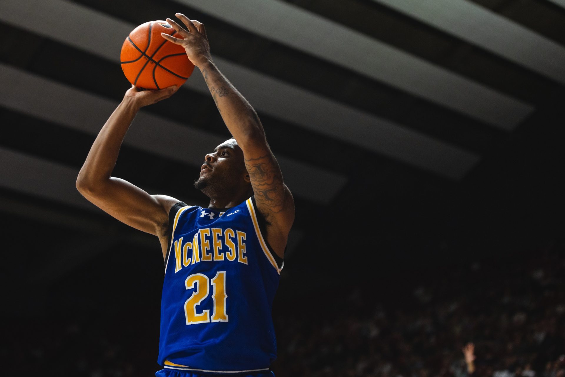 McNeese State Cowboys guard Sincere Parker (21) shoots against the Alabama Crimson Tide during the second half at Coleman Coliseum.