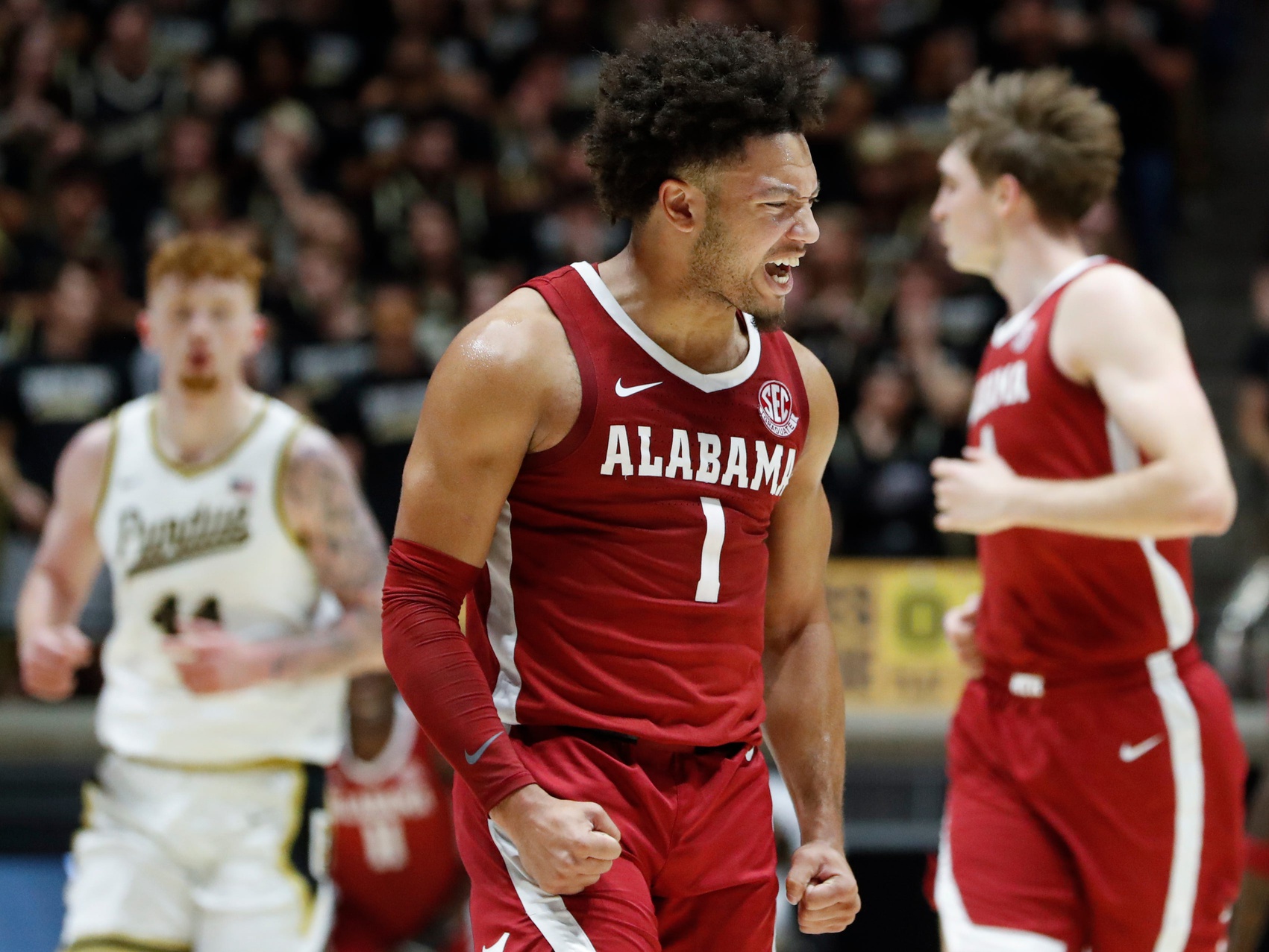 Alabama Crimson Tide guard Mark Sears (1) celebrates after scoring Friday, Nov. 15, 2024, during the NCAA men’s basketball game against the Purdue Boilermakers at Mackey Arena in West Lafayette, Ind.