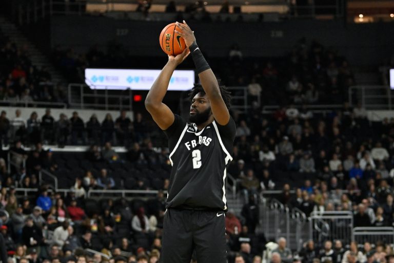 Providence Friars forward Christ Essandoko (2) shoots during the first half against the Green Bay Phoenix at Amica Mutual Pavilion.