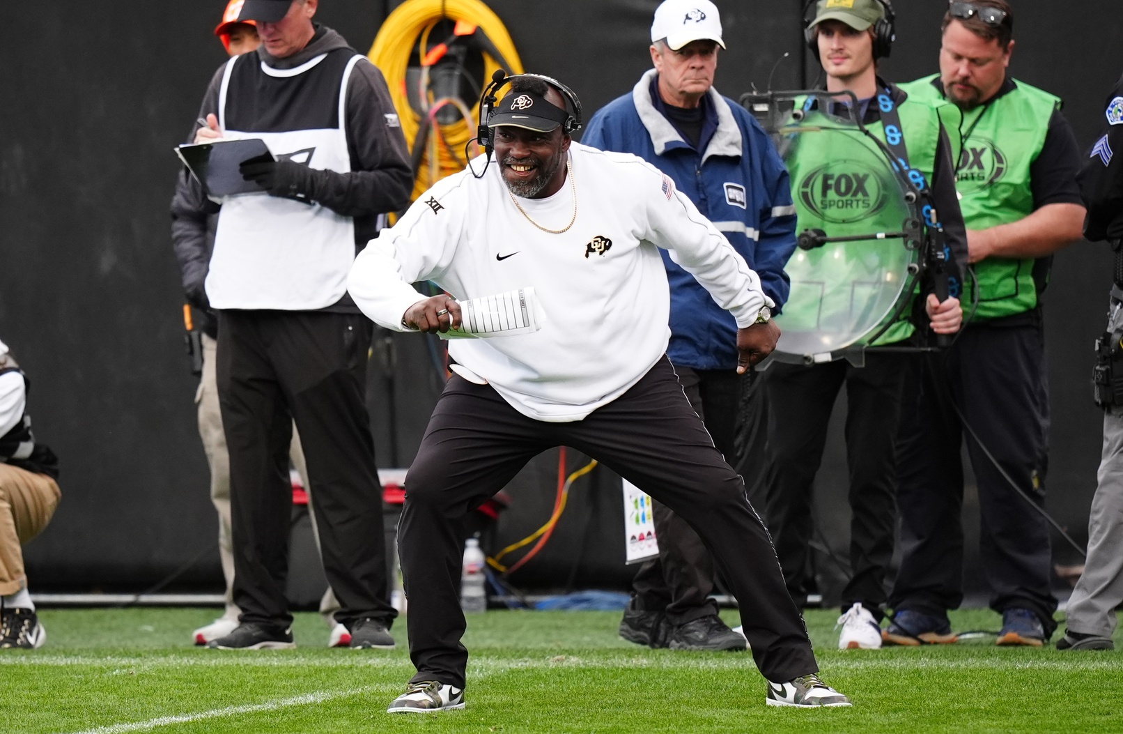 Colorado Buffaloes senior quality control analyst Warren Sapp reacts to a play in the second half against the Utah Utes