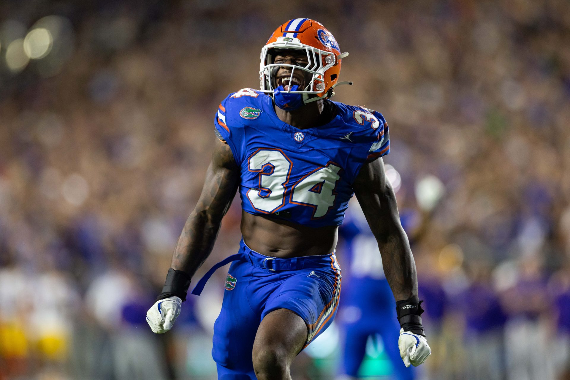 Florida Gators defensive end George Gumbs Jr. (34) reacts after a sack on the quarterback against the LSU Tigers during the second half at Ben Hill Griffin Stadium.