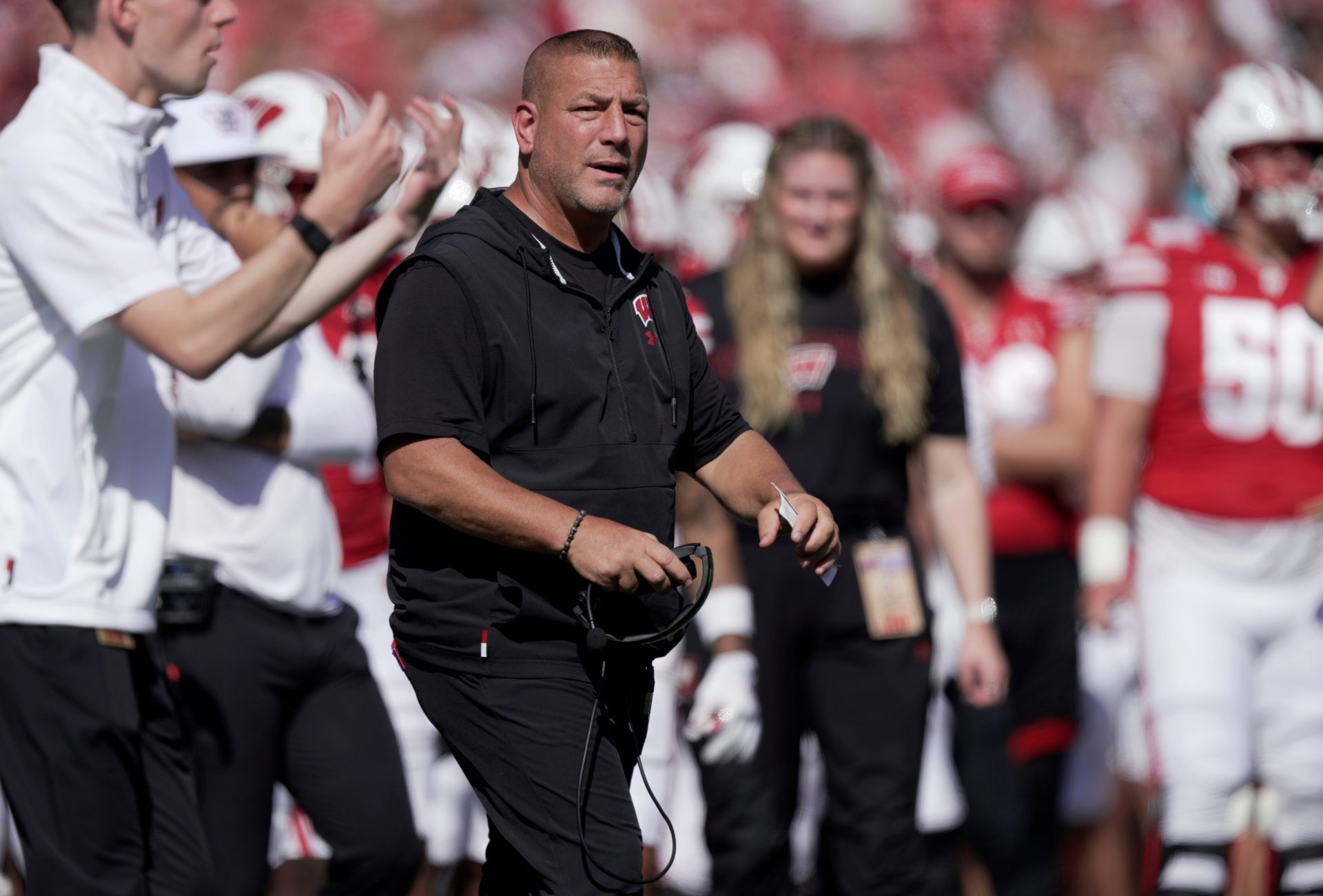 Wisconsin offensive coordinator Phil Longo was told he was being fired by head coach Luke Fickell on Sunday morning.