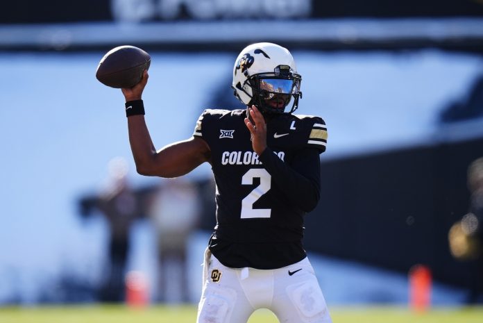 Colorado Buffaloes quarterback Shedeur Sanders (2) prepares to pass the ball in the third quarter against the Oklahoma State Cowboys at Folsom Field.