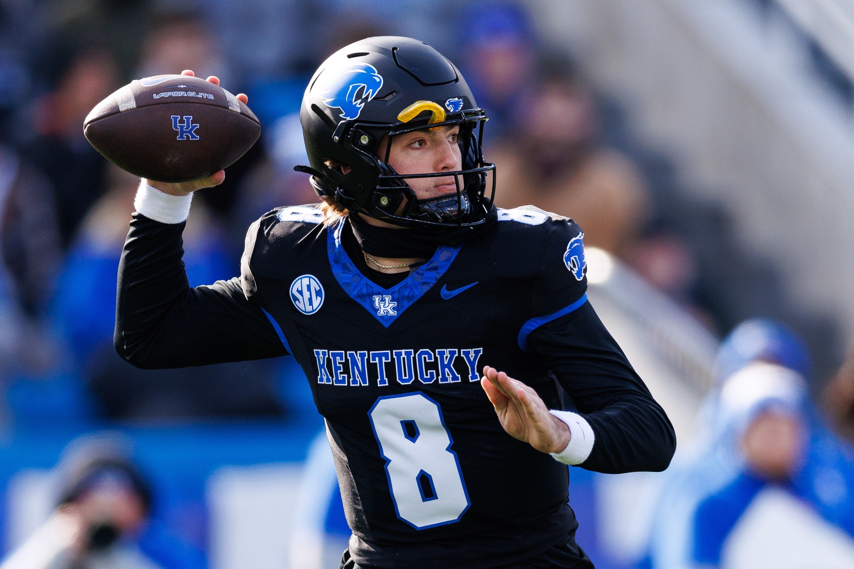 Kentucky Wildcats quarterback Cutter Boley (8) throws a pass during the first quarter against the Louisville Cardinals at Kroger Field.