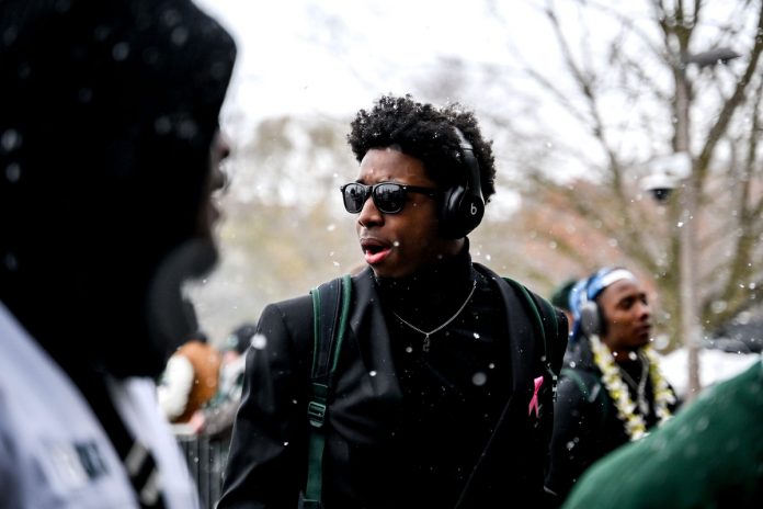 Michigan State quarterback Aidan Chiles enters Spartan Stadium before the football game against Rutgers on Saturday, Nov. 30, 2024, in East Lansing.