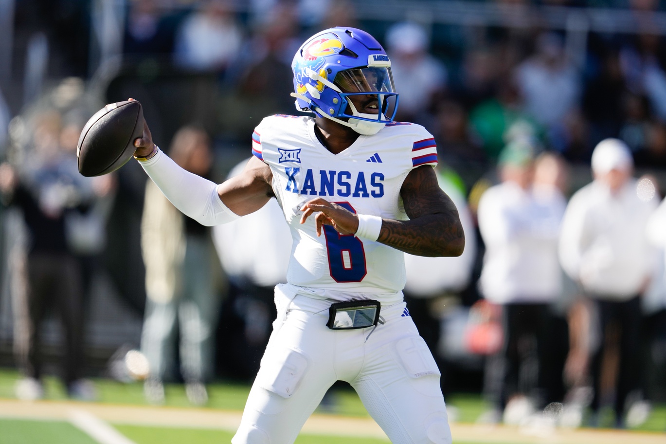 Kansas Jayhawks quarterback Jalon Daniels (6) drops back to pass against the Baylor Bears during the second half at McLane Stadium.