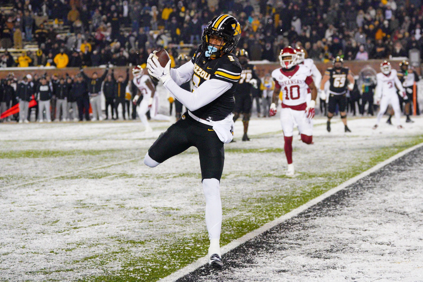 Missouri Tigers wide receiver Luther Burden III (3) catches a pass for a two point conversion against the Arkansas Razorbacks during the second half at Faurot Field at Memorial Stadium.