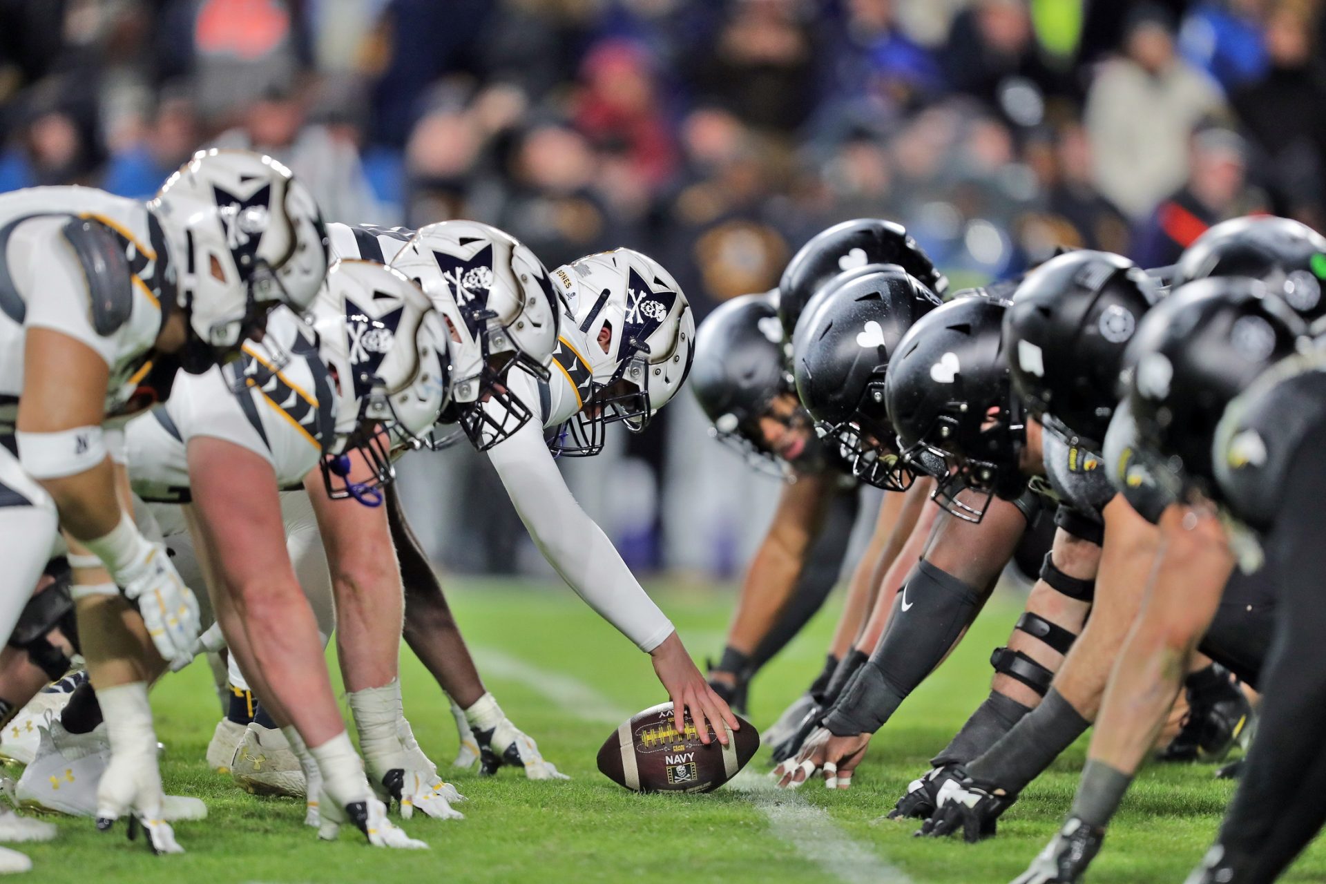 Army and Navy line up at the line of scrimmage during the second half of the the 125th Army-Navy game at Northwest Stadium.