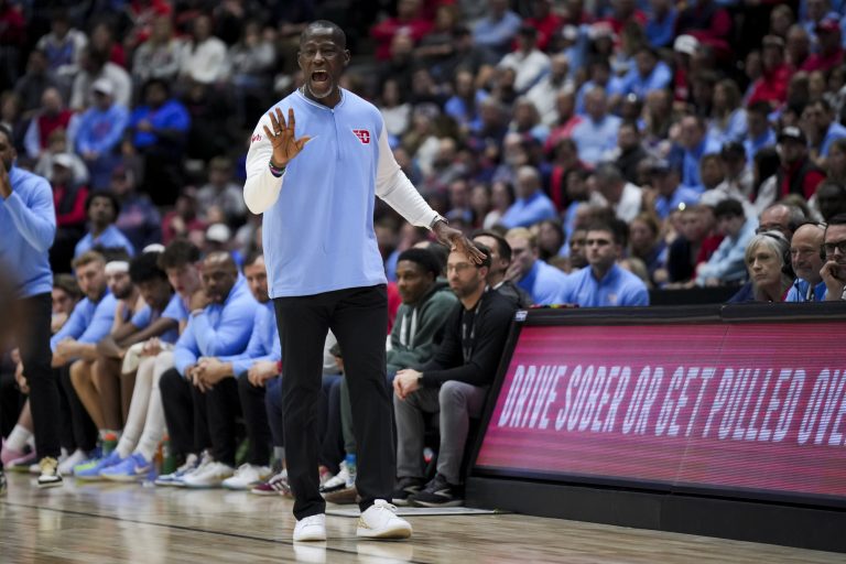 Dayton Flyers head coach Anthony Grant works the sideline against the Cincinnati Bearcats in the second half at Heritage Bank Center.