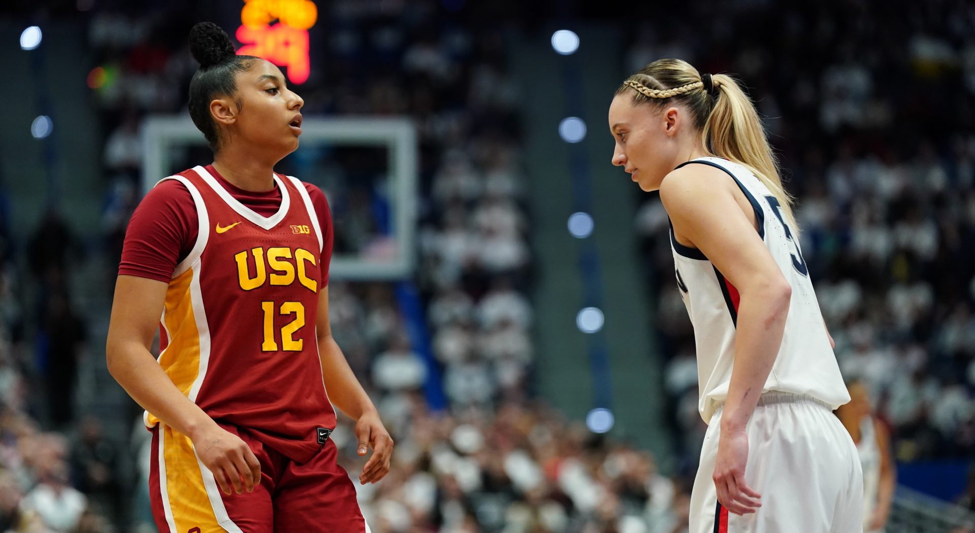 UConn Huskies guard Paige Bueckers (5) and USC Trojans guard JuJu Watkins (12) on the court in the first half at XL Center.