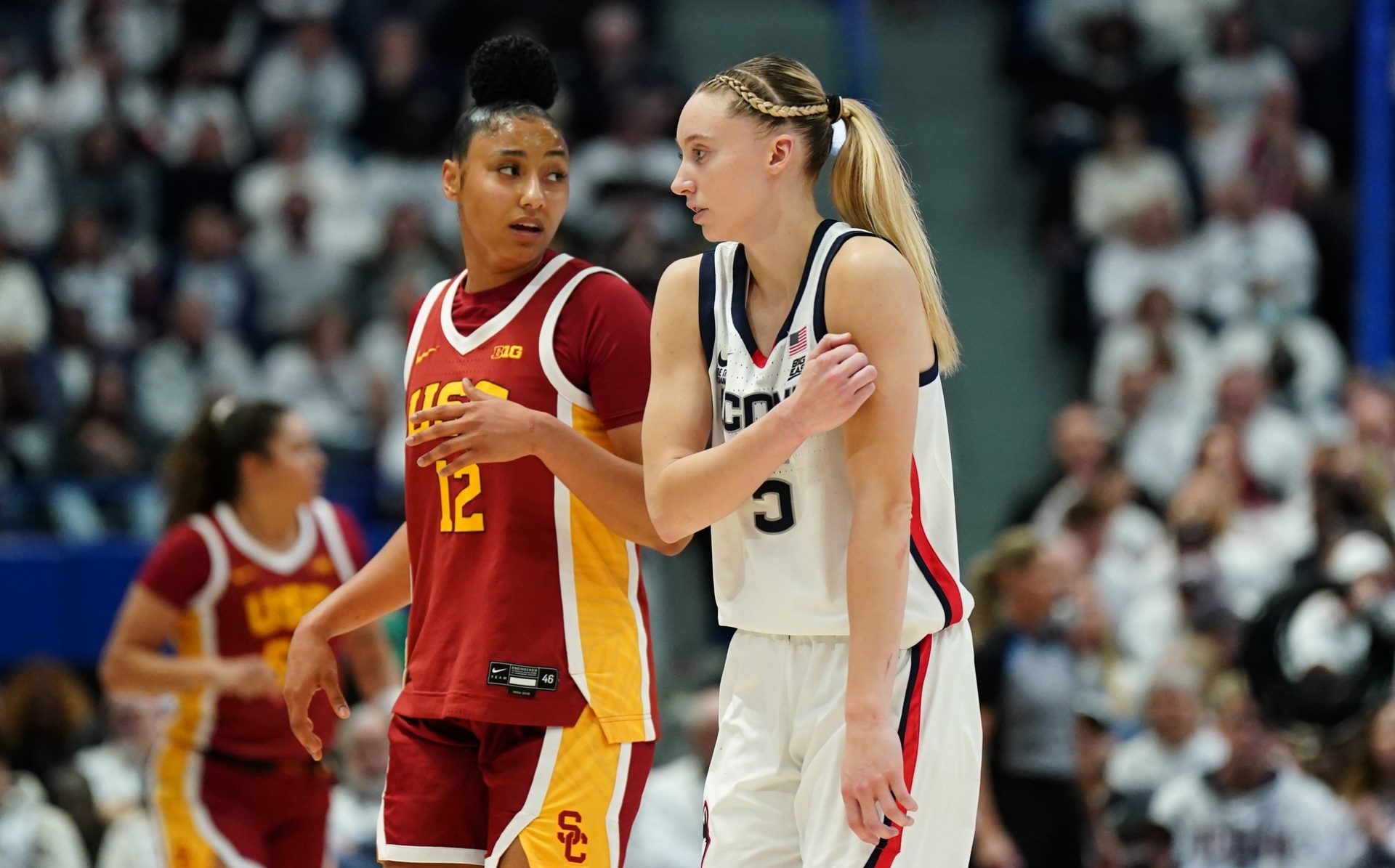 The race for the National Player of the Year is catching fire. Will Paige Bueckers or JuJu Watkins earn the honor in 2025?