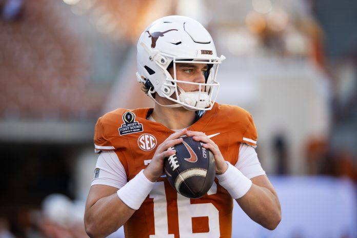 Texas Longhorns quarterback Arch Manning (16) against the Clemson Tigers during the CFP National playoff first round at Darrell K Royal-Texas Memorial Stadium.