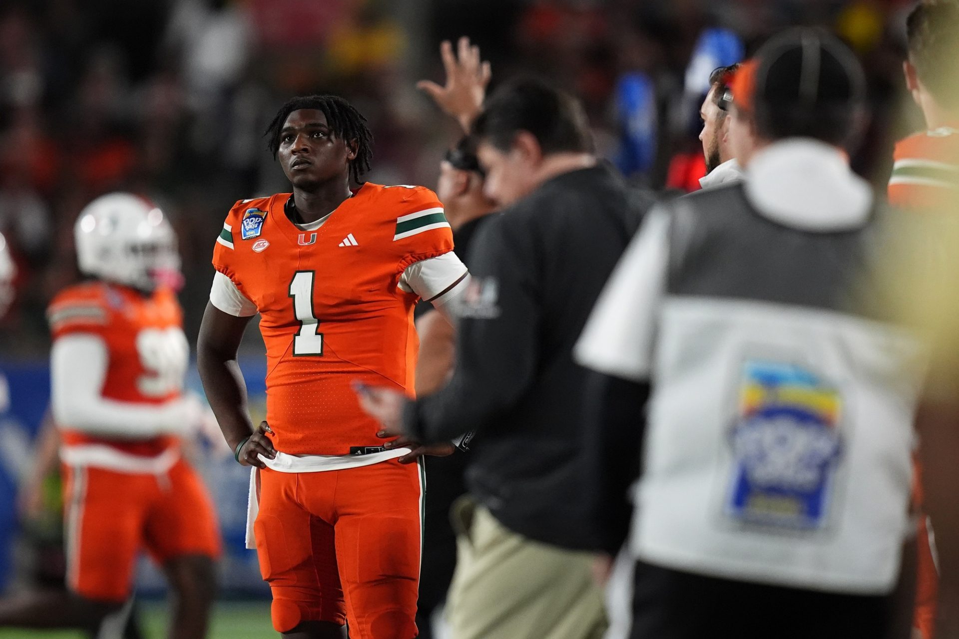 Miami Hurricanes quarterback Cam Ward (1) looks up at the scoreboard during the second half against the Iowa State Cyclones at Camping World Stadium.