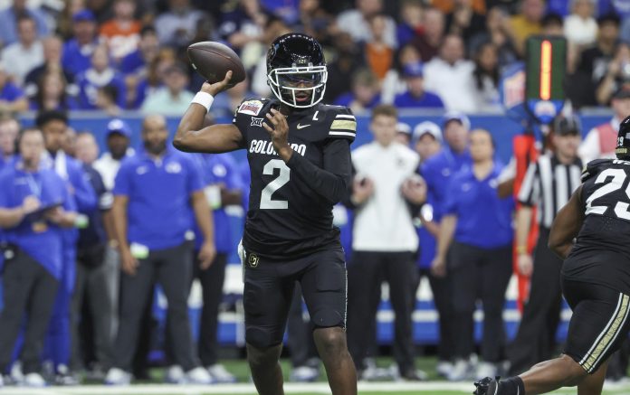 Colorado Buffaloes quarterback Shedeur Sanders (2) attempts a pass during the first quarter against the Brigham Young Cougars at Alamodome.