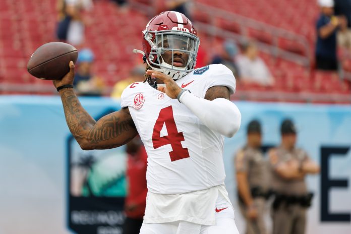 Alabama Crimson Tide quarterback Jalen Milroe (4) throws the ball before a game against the Michigan Wolverines