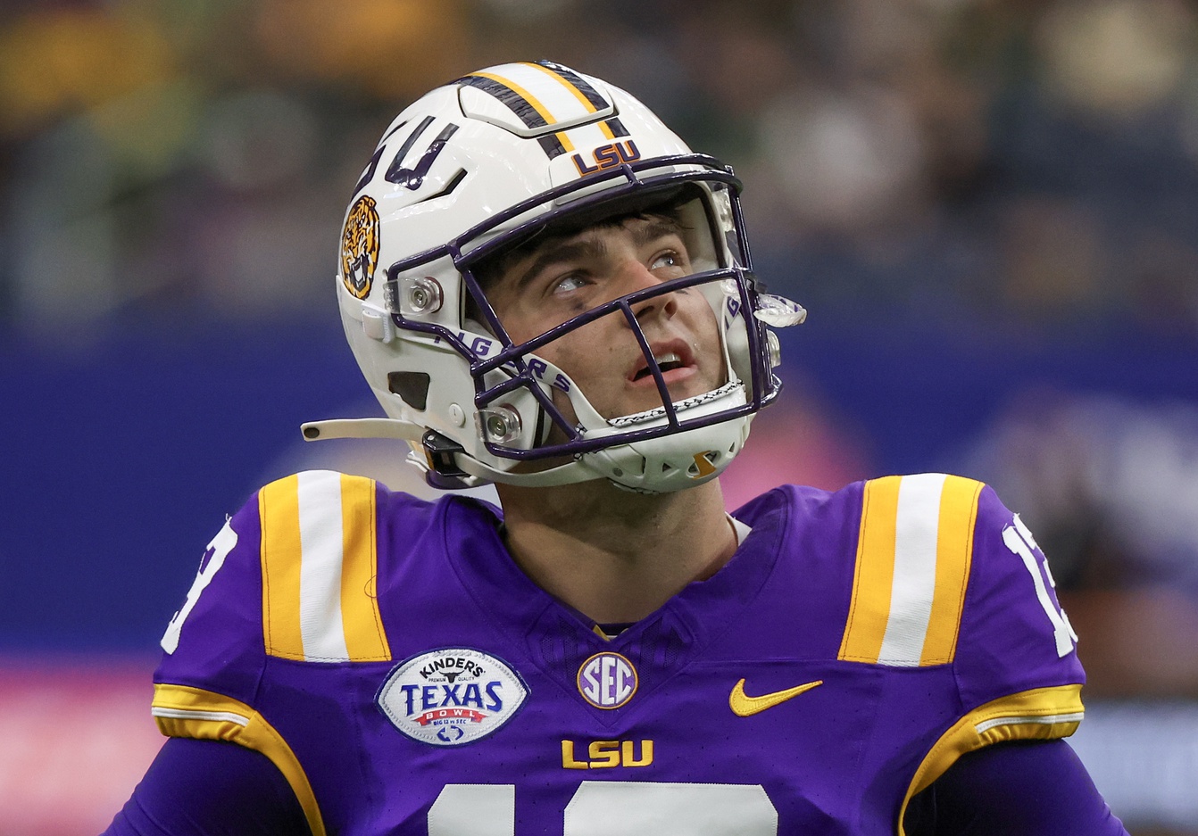 LSU Tigers quarterback Garrett Nussmeier (13) looks at the scoreboard during an officials time-out against the Baylor Bears in the second quarter at NRG Stadium.