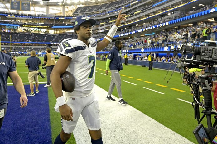 Seattle Seahawks quarterback Geno Smith (7) leaves the field following the game against the Los Angeles Rams at SoFi Stadium.