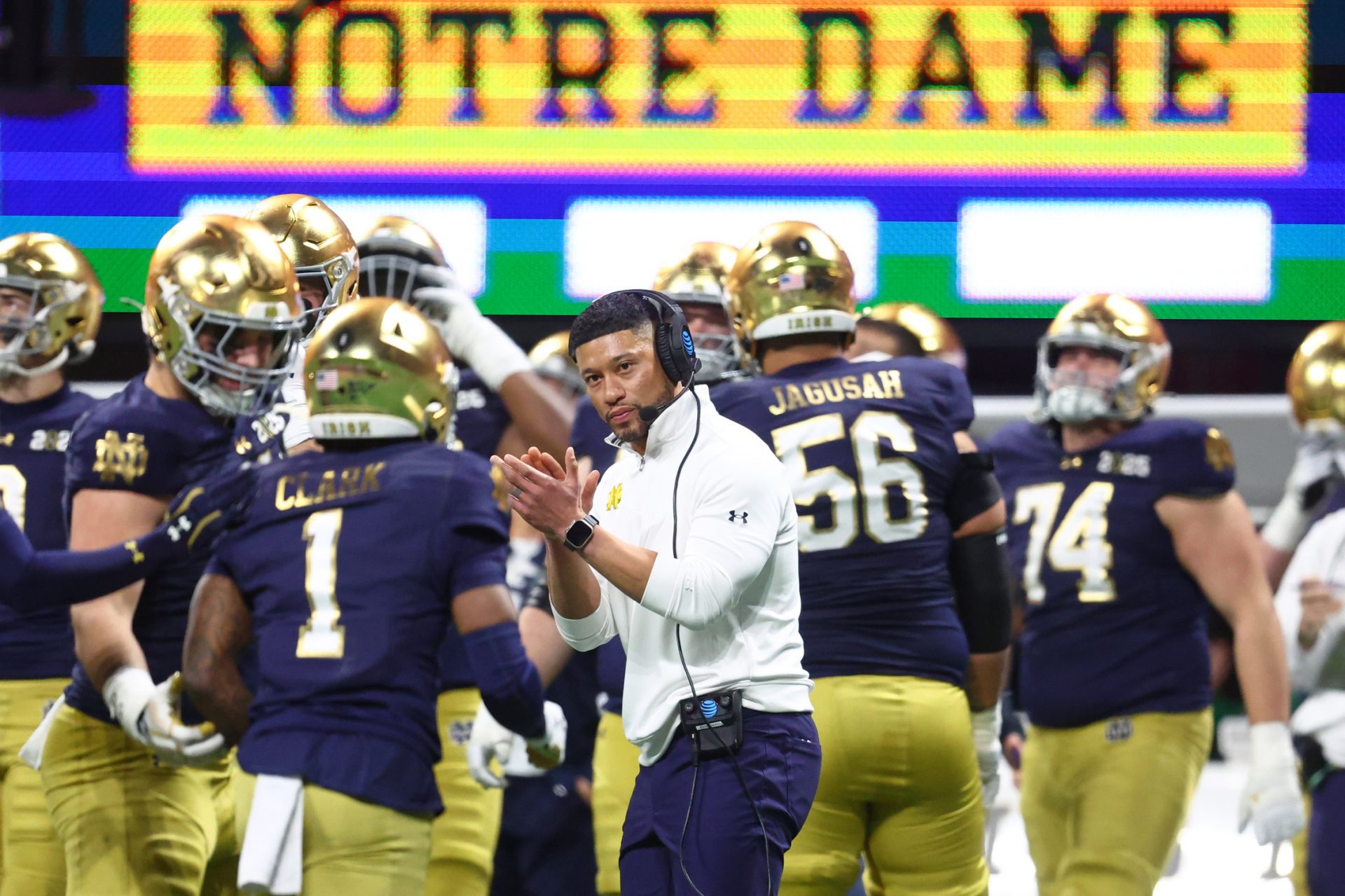 Notre Dame Fighting Irish head coach Marcus Freeman reacts after a play against the Ohio State Buckeyes during the second half the CFP National Championship college football game at Mercedes-Benz Stadium.