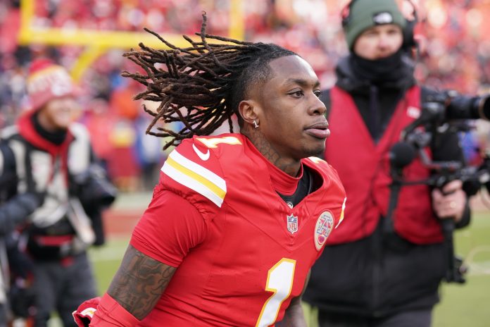 Kansas City Chiefs wide receiver Xavier Worthy (1) warms up against the Houston Texans prior to a 2025 AFC divisional round game at GEHA Field at Arrowhead Stadium.