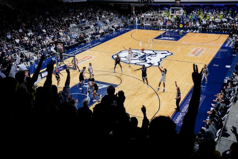 Butler Bulldogs guard Kolby King (12) shoots a 3-pointer Tuesday, Jan. 28, 2025, during an NCAA men’s basketball game between the Butler Bulldogs and the Marquette Golden Eagles at Hinkle Fieldhouse in Indianapolis.