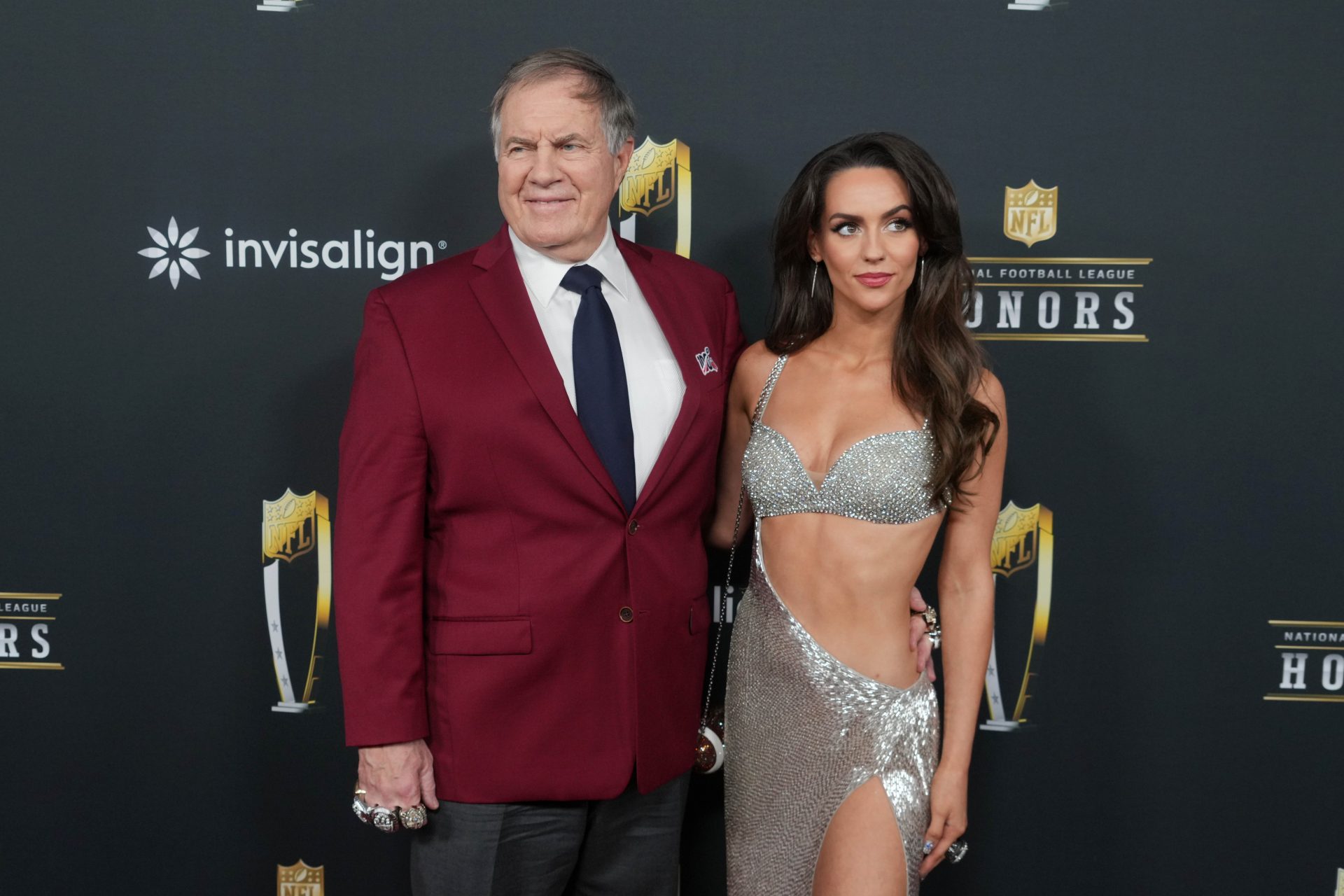 Bill Belichick and Jordon Hudson on the red carpet before Super Bowl LIX NFL Honors at Saenger Theatre.