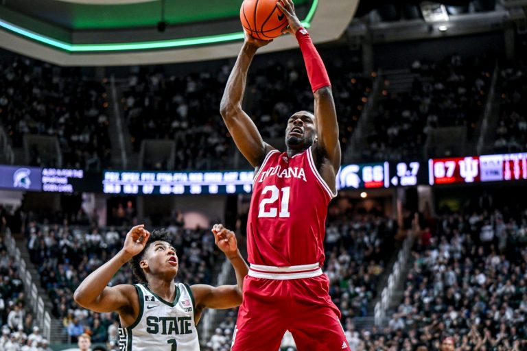 Indiana's Mackenzie Mgbako, right, catches an inbound pass as Michigan State's Jeremy Fears Jr. pressures during the second half