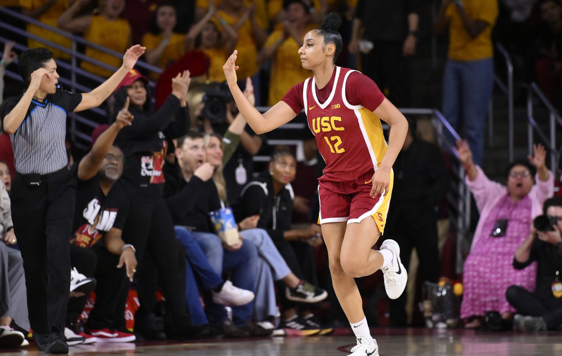 USC Trojans guard JuJu Watkins (12) celebrates making a 3-point basket during the second quarter against the UCLA Bruins at Galen Center.