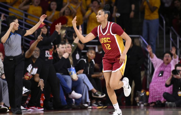 USC Trojans guard JuJu Watkins (12) celebrates making a 3-point basket during the second quarter against the UCLA Bruins at Galen Center.