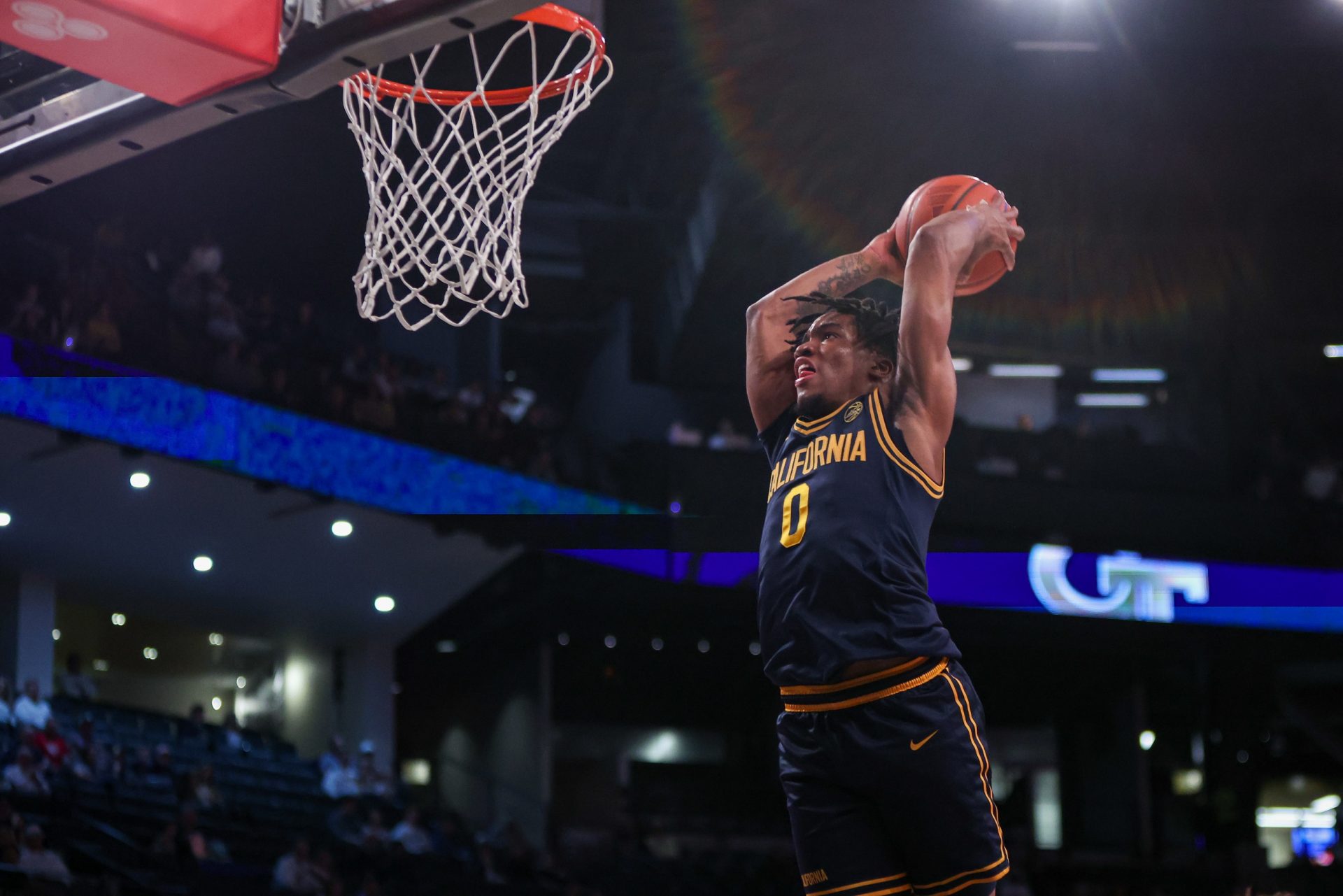 California Golden Bears guard Jeremiah Wilkinson (0) dunks against the Georgia Tech Yellow Jackets in the first half at McCamish Pavilion.