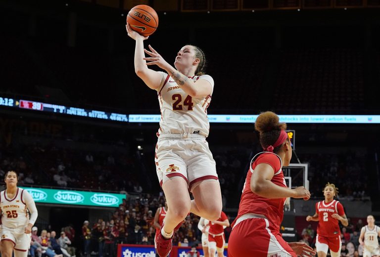 Iowa State Cyclones' forward Addy Brown (24) shoots the ball over the ball around Houston Cougars guard Laila Blair (14) during the fourth quarter in the Big-12 women’s basketball at Hilton Coliseum on Wednesday, Feb19, 2025, in Ames, Iowa.