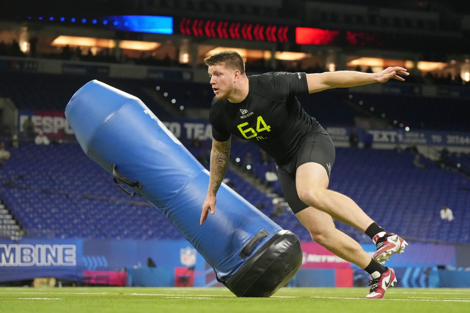 Ohio State defensive lineman Jack Sawyer (DL64) participates in drills during the 2025 NFL Combine at Lucas Oil Stadium.