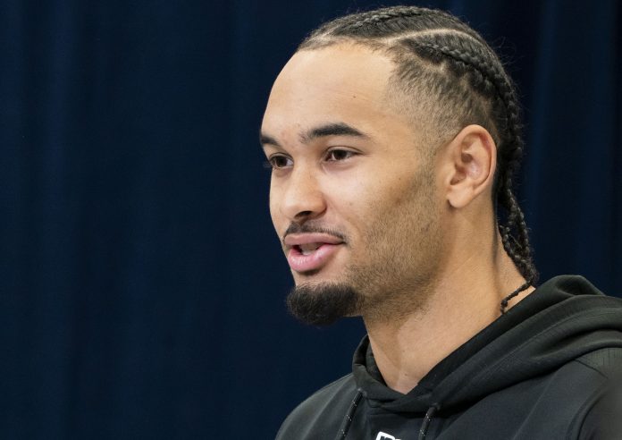 Ohio State wideout Emeka Egbuka (WO12) speaks during a press conference during the 2025 NFL Combine at Indiana Convention Center.