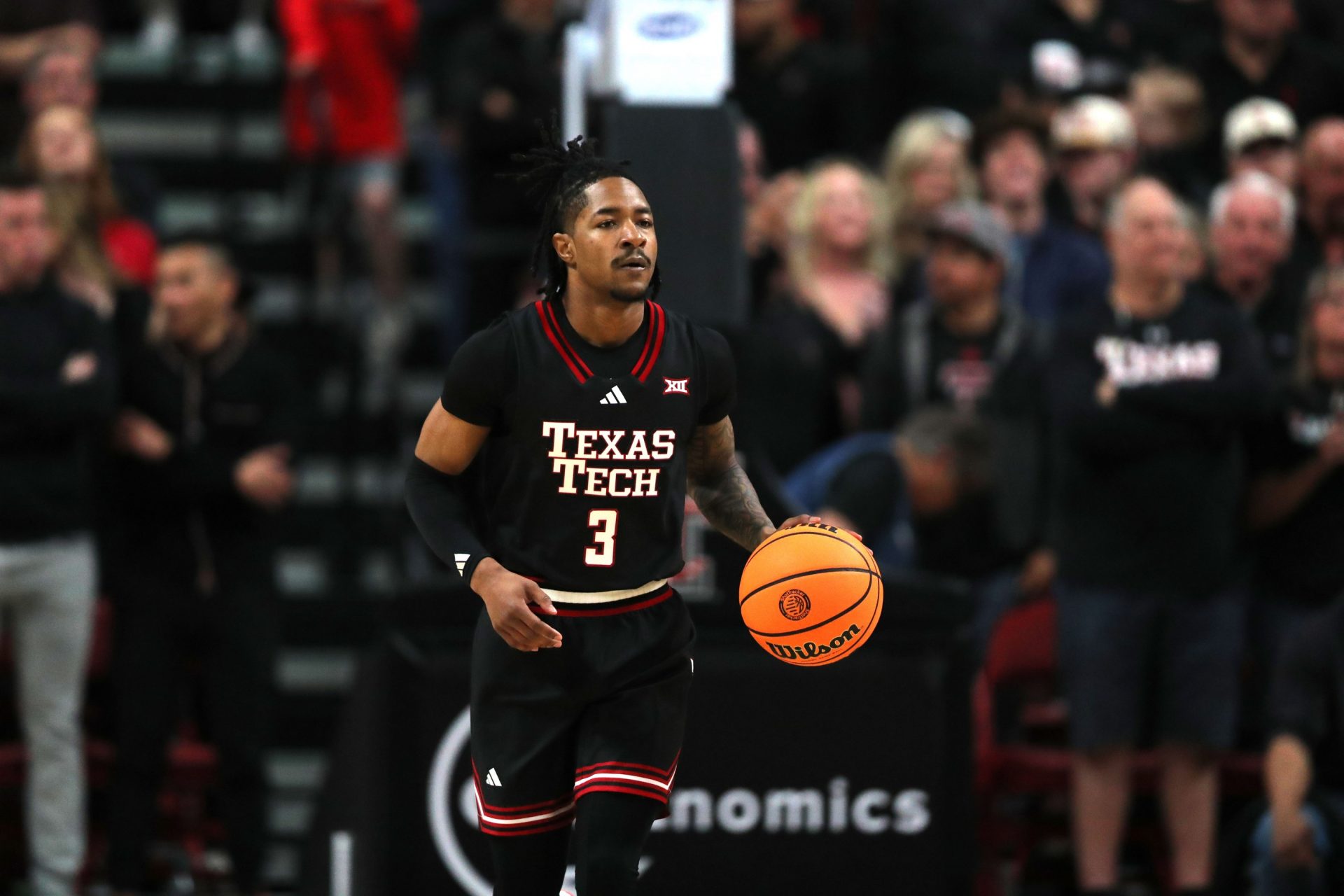 Texas Tech Red Raiders guard Elijah Hawkins (3) brings the ball up court against the Houston Cougars in the first half at United Supermarkets Arena.