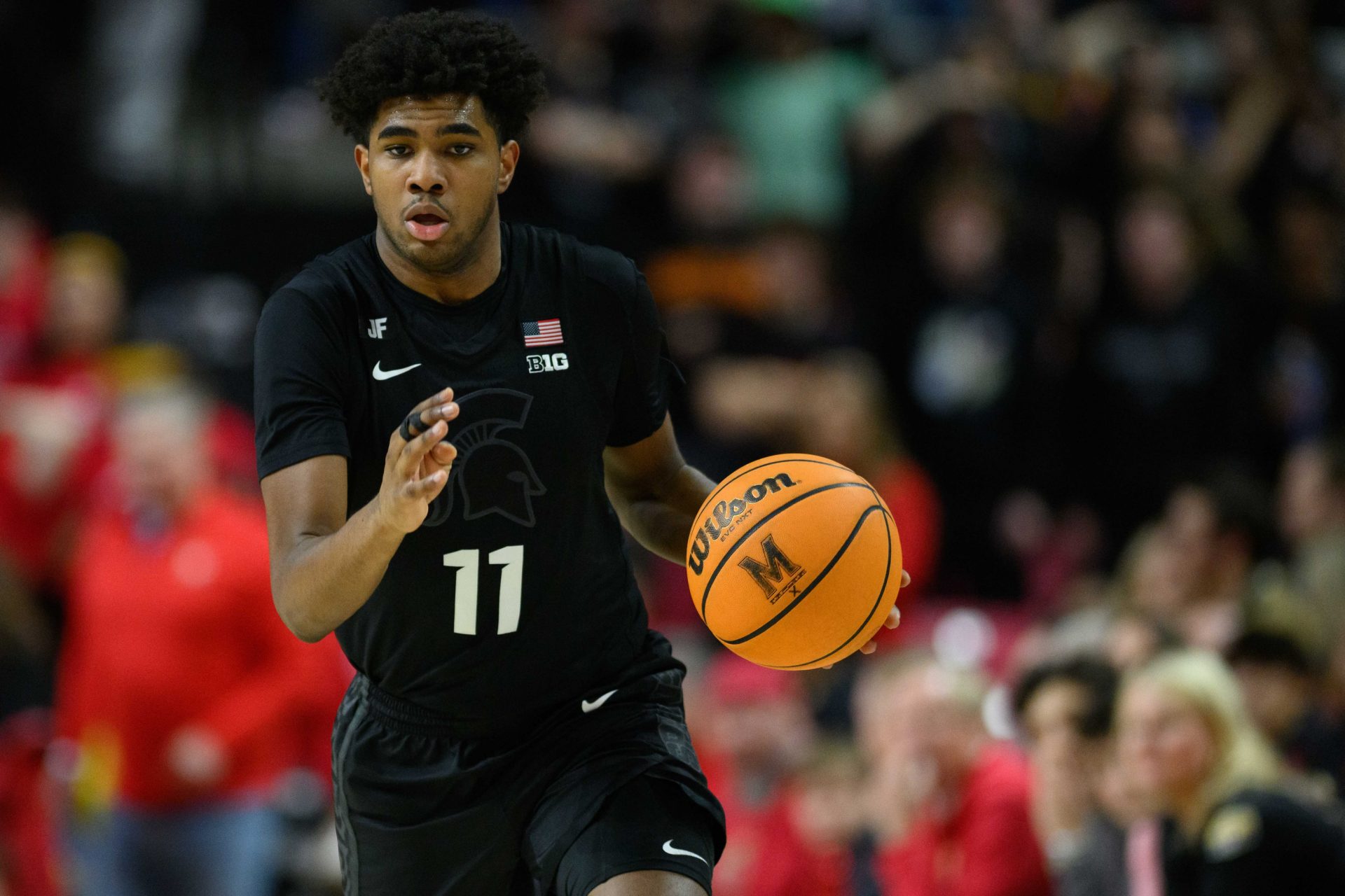 Michigan State Spartans guard Jase Richardson (11) handles the ball during the first half against the Maryland Terrapins at Xfinity Center.